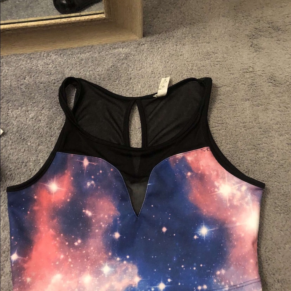 Galaxy crop top. Really cute and has mesh fabric.
